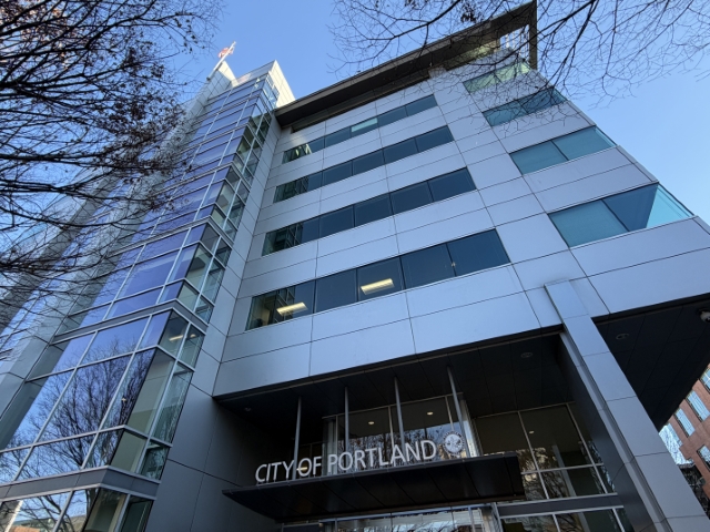 Low-angle exterior view of the 1900 Building in downtown Portland, Oregon, headquarters of the Portland Bureau of Development Services