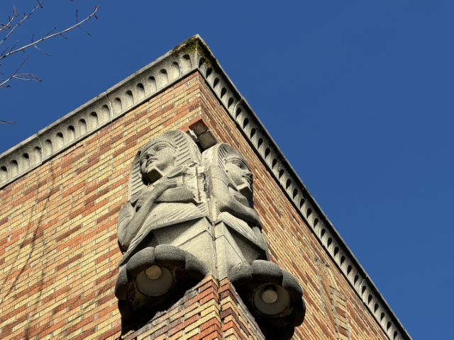 Blackstone Hall exterior at Portland State University, 1931 Egyptian Revival building on the city’s Historic Resources Inventory, facing planned demolition – Portland historic preservation and real estate appraisal context. This photo zooms in on sculptures.