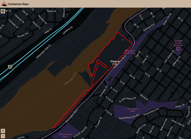 Clackamas County GIS map showing the ~22-acre riverfront parcel of the former Blue Heron Paper Mill site at Willamette Falls in Oregon City.