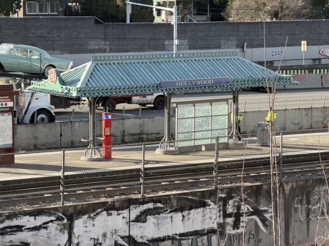 Hollywood MAX station platform adjacent to hollywoodHUB construction site, Northeast Portland – January 12, 2026, showing direct transit access