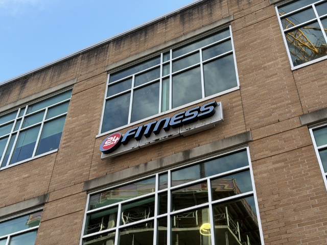 24 Hour Fitness building directly across the hollywoodHUB construction site, Hollywood Transit Center, Portland – January 12, 2026.